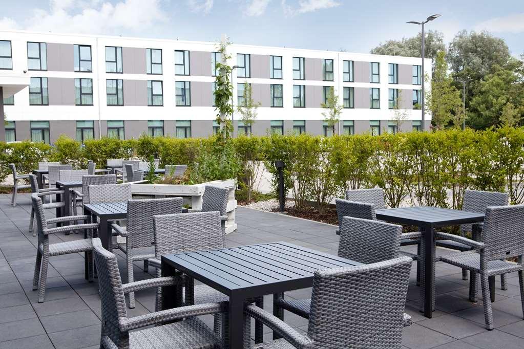 فندق هالبرغموسفي  Hampton By Hilton Munich Airport South المطعم الصورة